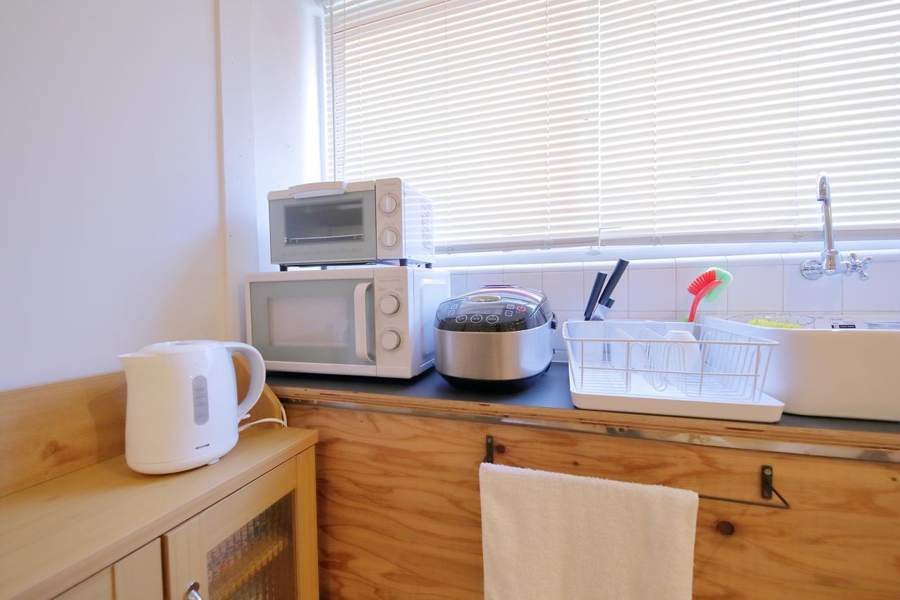 Raku Hostel Ōsaka Extérieur photo