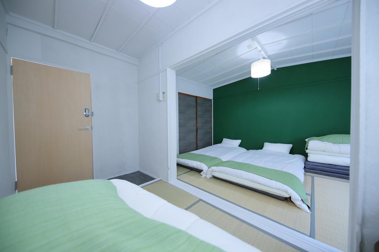 Raku Hostel Ōsaka Extérieur photo