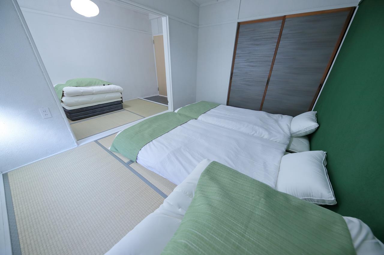 Raku Hostel Ōsaka Extérieur photo