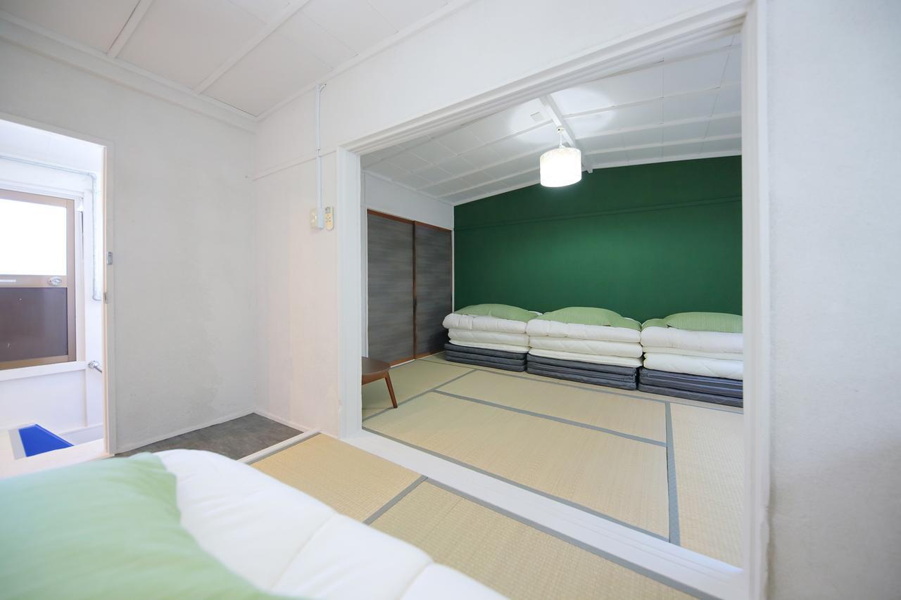 Raku Hostel Ōsaka Extérieur photo