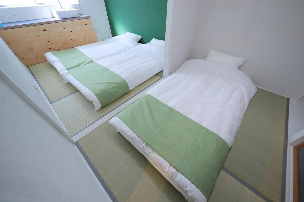 Raku Hostel Ōsaka Extérieur photo