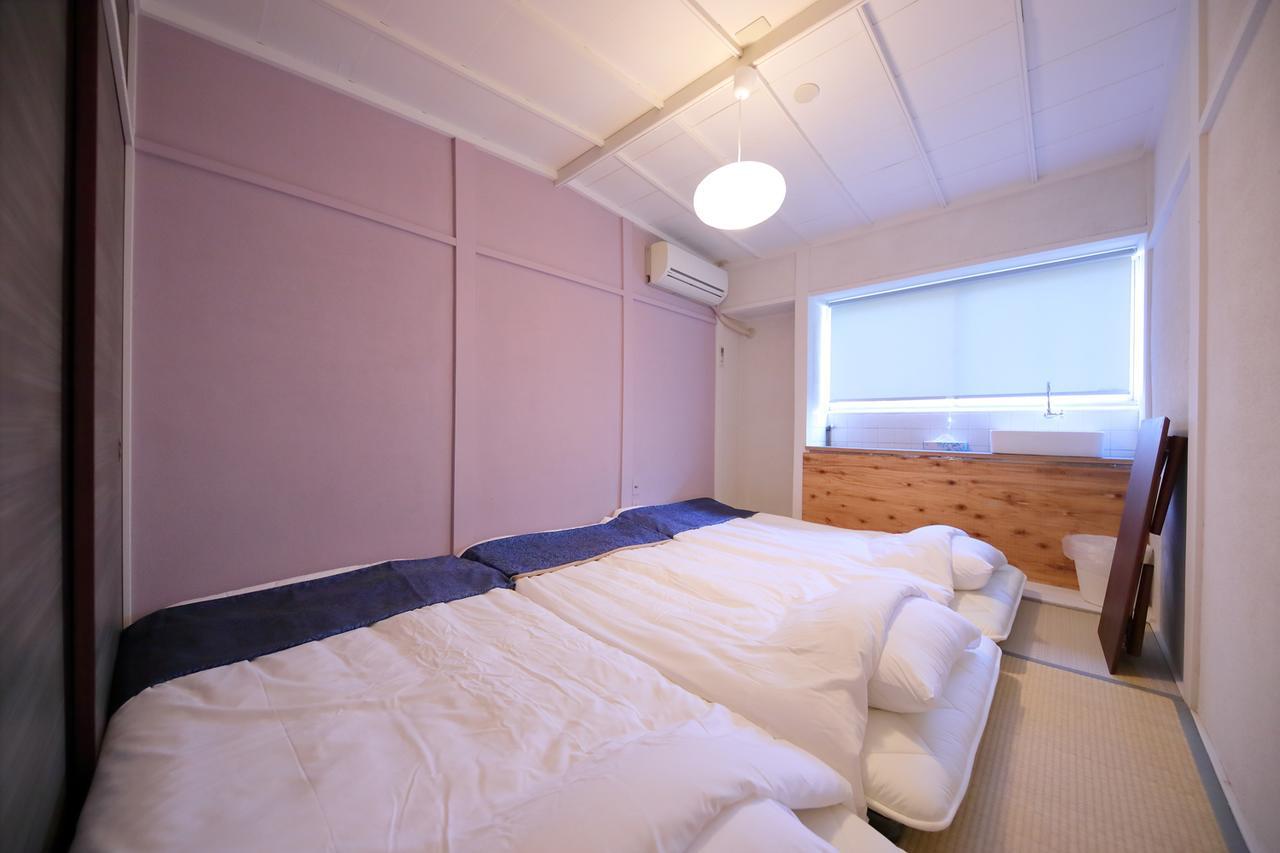 Raku Hostel Ōsaka Extérieur photo